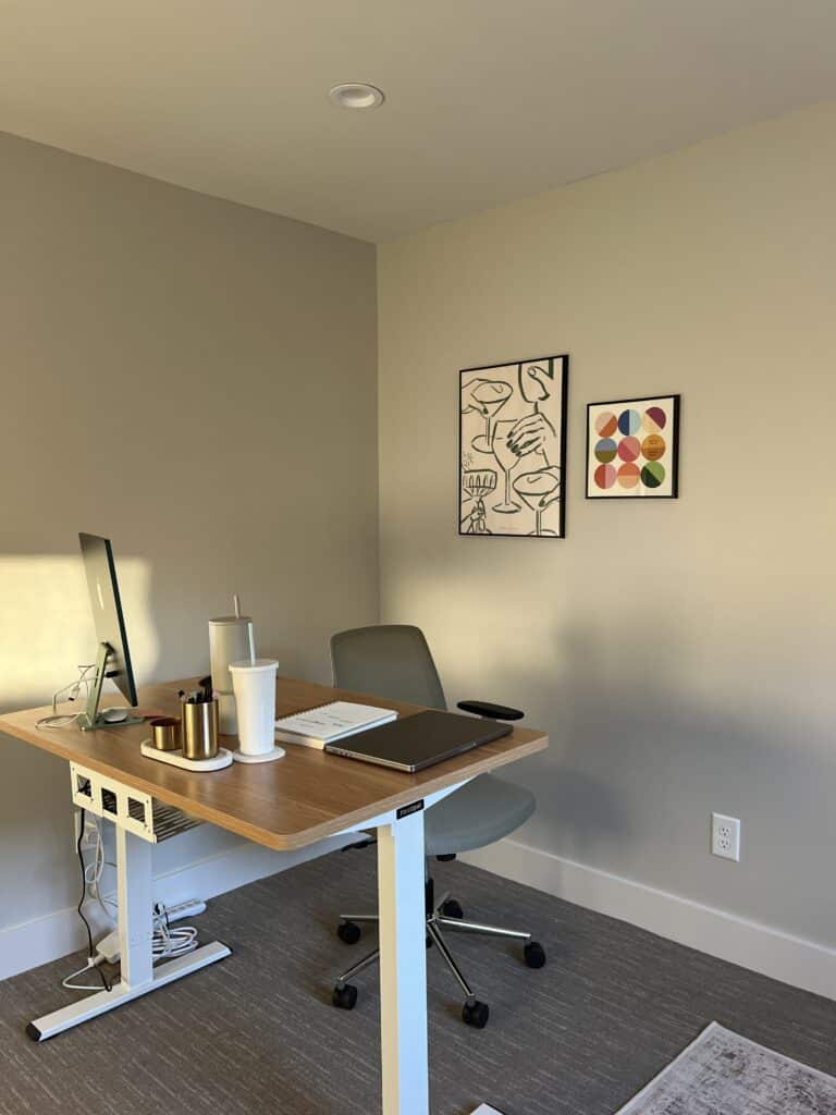 photo of office space with golden coil planner on table