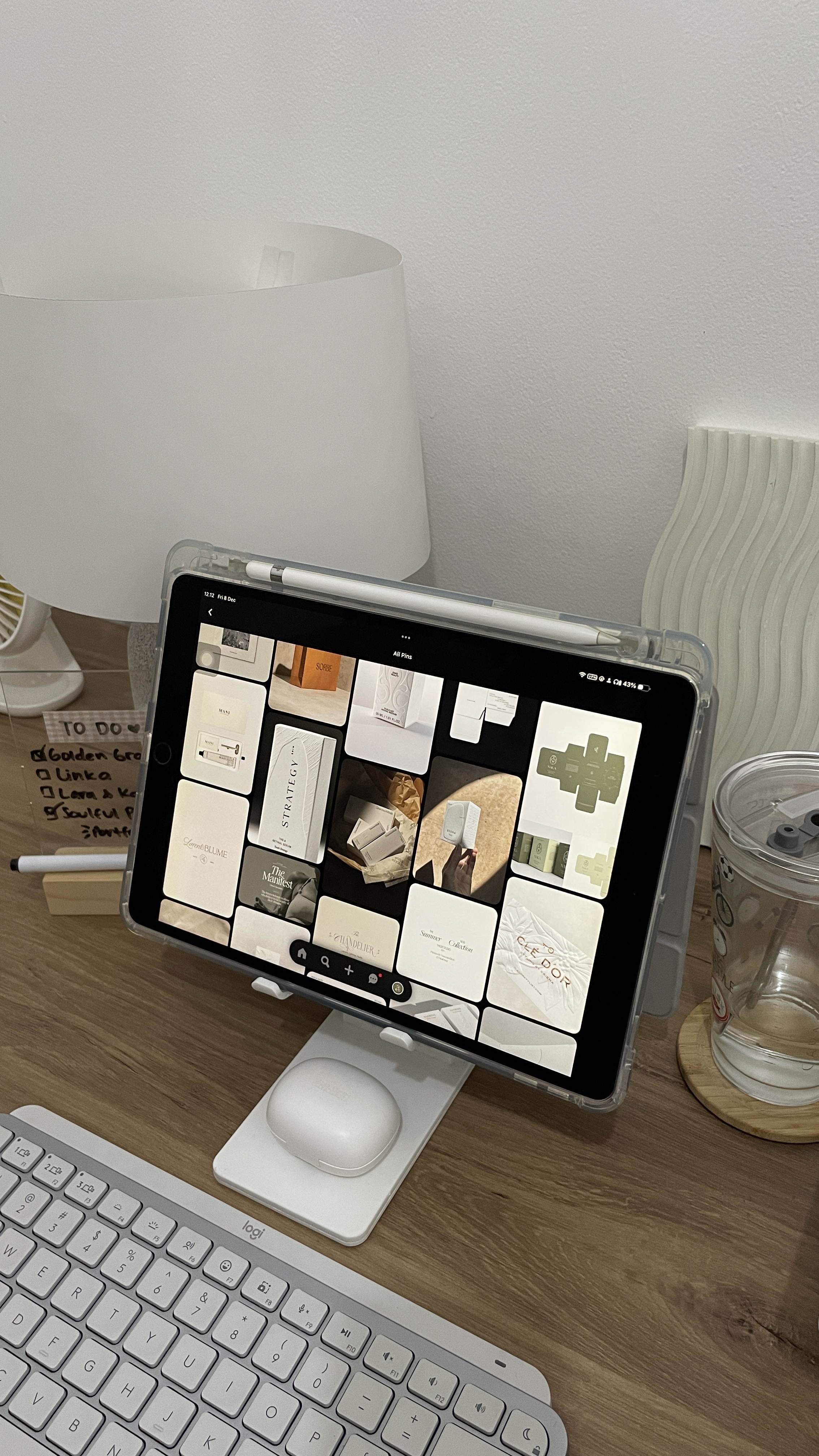 An iPad displays images on a desk beside a keyboard, illustrating alt text for SEO